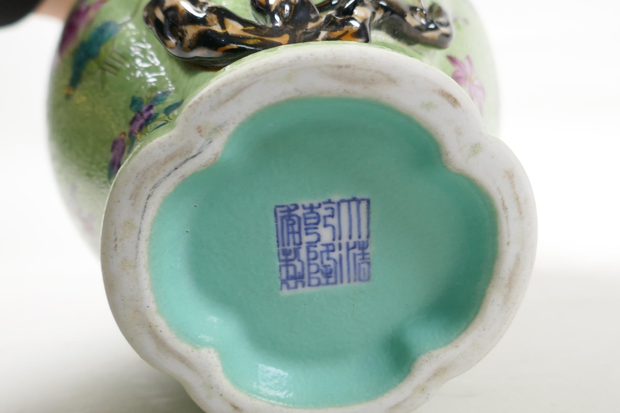 A Chinese polychrome porcelain vase with applied peach tree decoration on a green ground, seal - Image 5 of 6