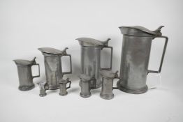 A set of eight C19th French pewter measures by Bazire, 21ltr to 1centilitre, largest 10" high