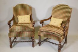 A pair of French style open arm hump back chairs, 40" high