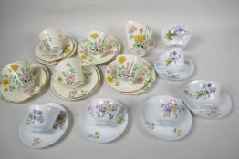 A five place setting Aynsley china tea set with milk jug, together with a five place setting Shelley