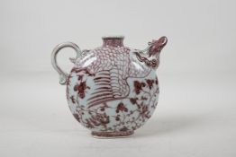 A Chinese red and white porcelain phoenix pourer, 7" high