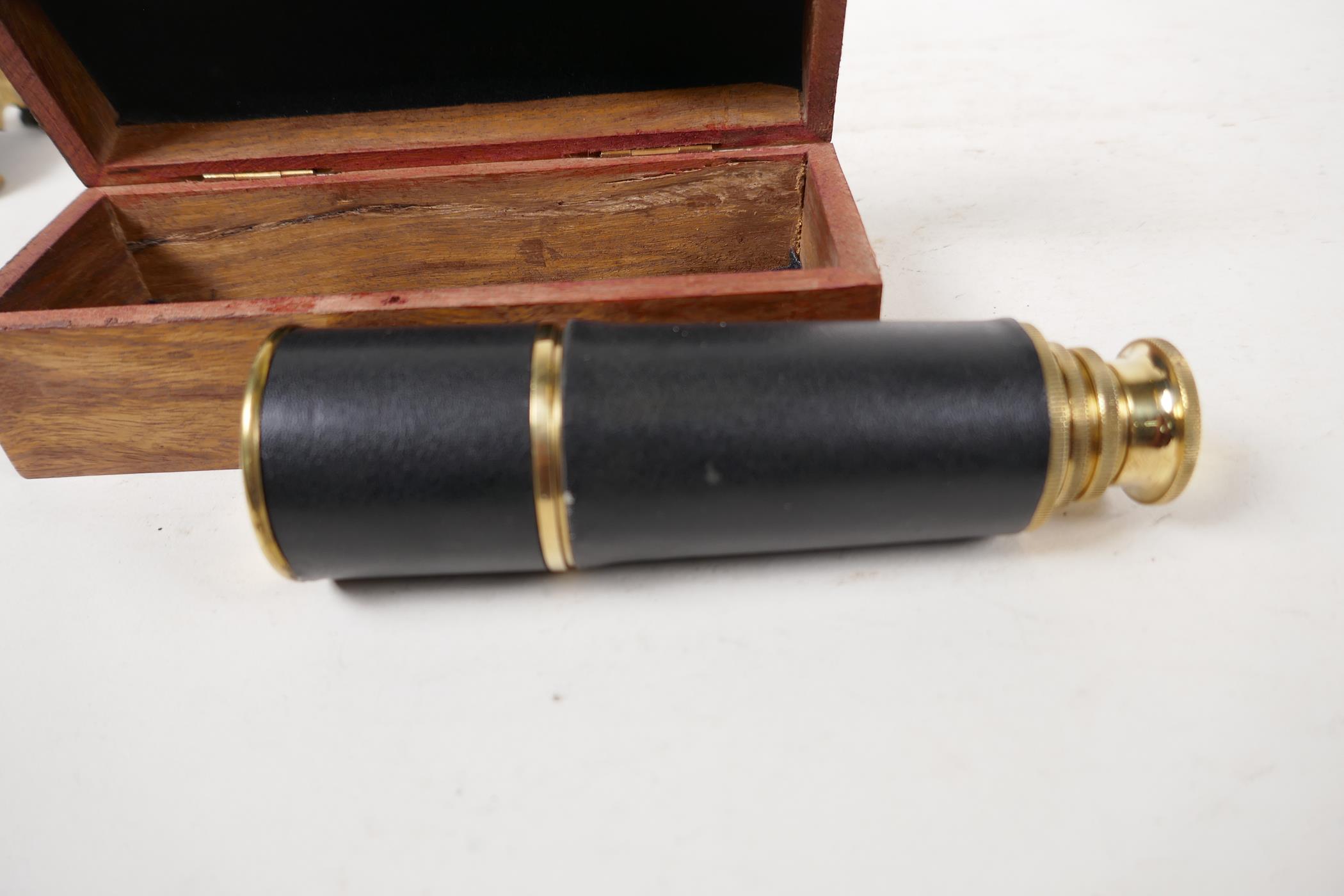 A two draw brass telescope, 13" long extended, in a hardwood box - Image 3 of 4