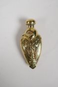 An 18ct gold plated perfume bottle in the form of a bird, 3"