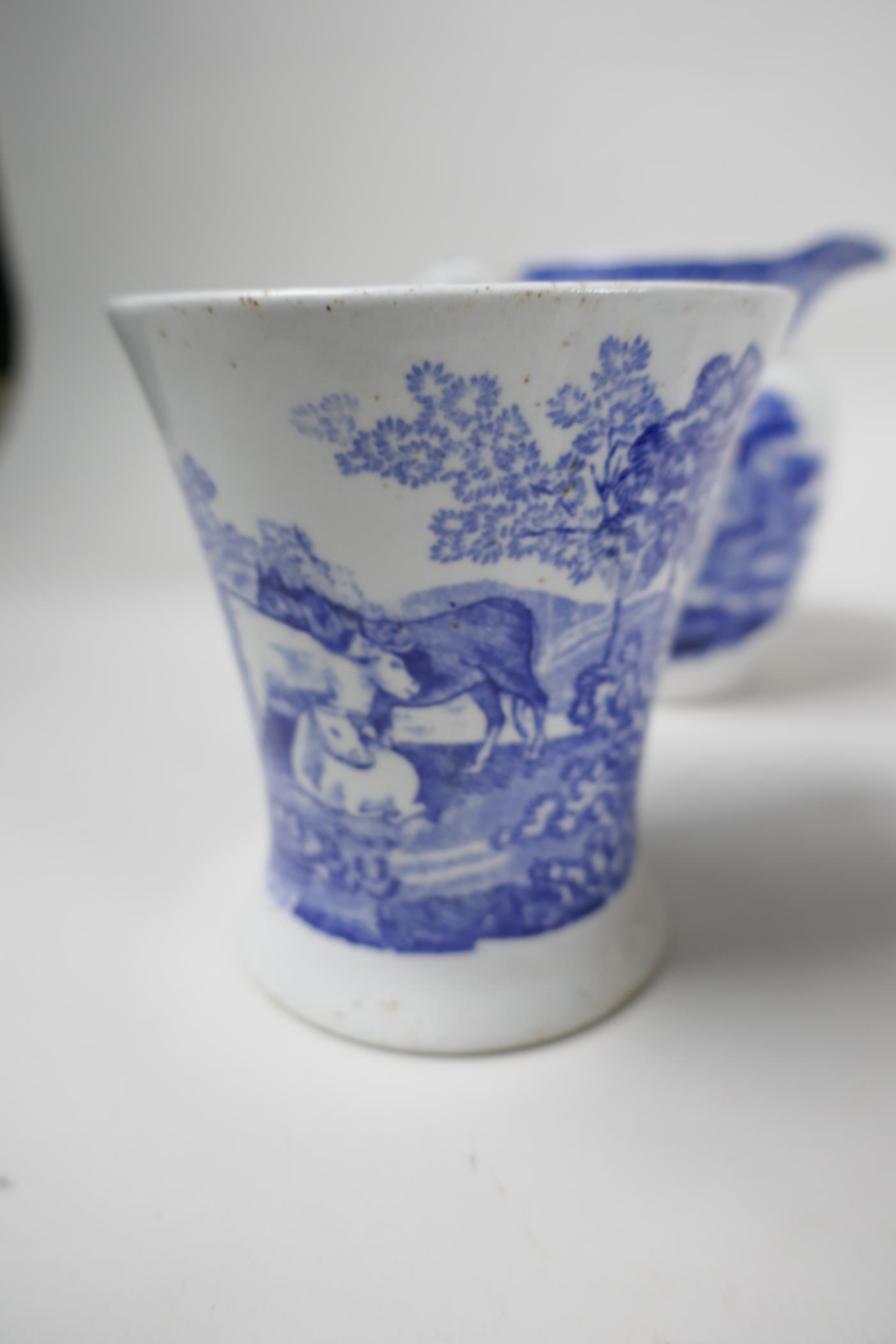 A collection of early C19th blue and white pottery mugs, jugs and small teapot - Image 8 of 8