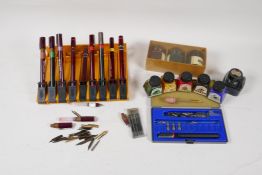 A collection of 'Rotring' technical drawing pens and caligraphy pens, with associate inks, spare