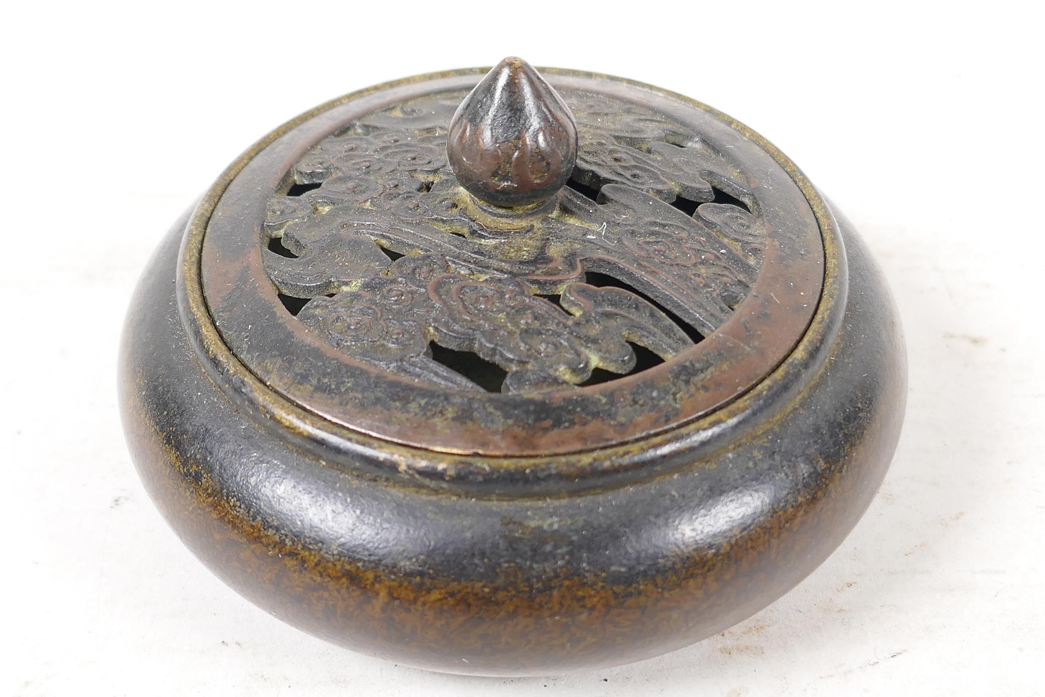 A bronze censer with pierced cover, 4" diameter - Image 2 of 2