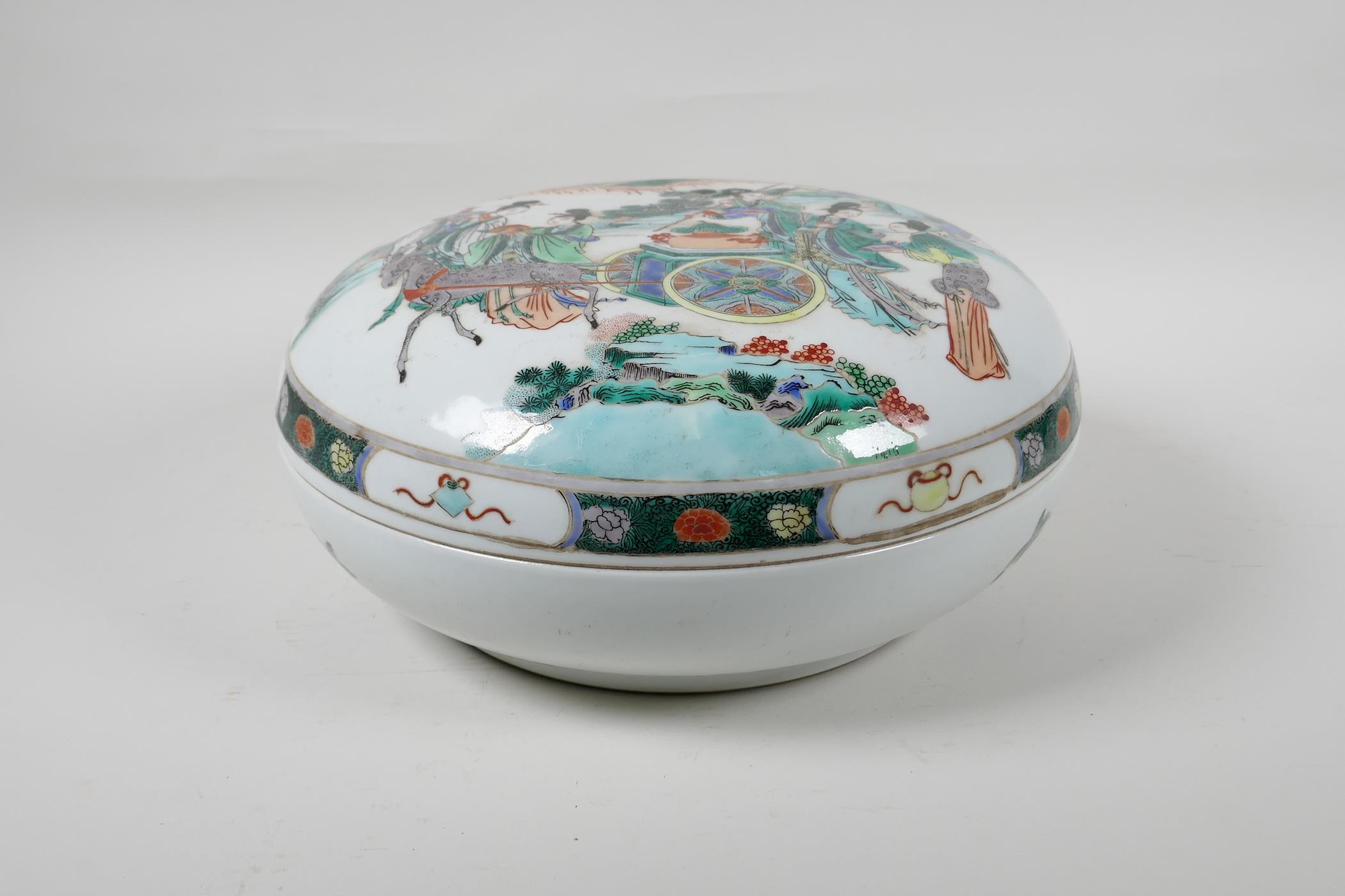 A Chinese famille vert porcelain box and cover, decorated with women and deer in a landscape, 11½"