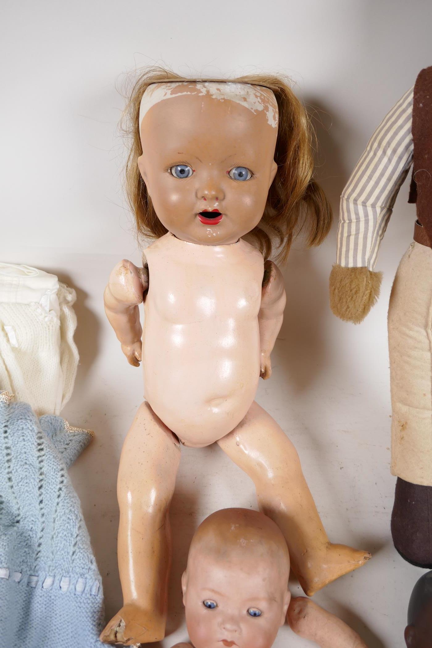An Armand Marseille 351/2K black baby doll, a 341/3K baby doll, a British made ceramic doll with - Image 2 of 6