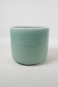 A celadon glazed porcelain brush pot with archaic style underglaze decoration, Chinese, 6½" high x