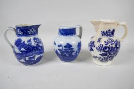 An early C19th blue and white pottery jug decorated in the Pagoda pattern, 5" high, together with