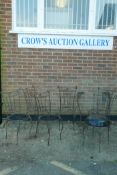 A set of six wrought iron garden chairs and matching table base, A/F lack seats