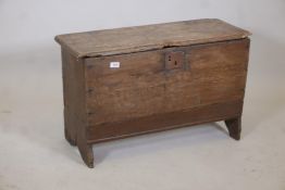 An early C18th oak planked coffer of small proportions, 33" x 13" x 21"