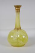 An early C20th Bohemian yellow swirled glass vase, with gilt details, 11" high