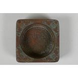 A Chinese Qianlong style bronze moon cake mould, 8 character mark to base, 3½" x 3½"