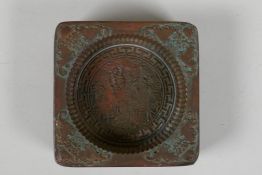 A Chinese Qianlong style bronze moon cake mould, 8 character mark to base, 3½" x 3½"