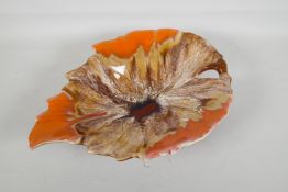 A studio pottery leaf shaped dish with an orange & brown glaze, minor loss, 15½" x 11"