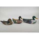 Three C19th folk art carved and painted wood decoy ducks, largest 12½"