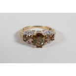 A 10ct yellow gold, tourmaline & diamond set ring, size P