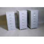 Three metal filing cabinets, 16" x 11" x 26"