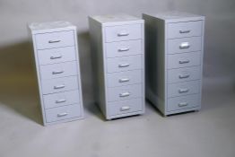 Three metal filing cabinets, 16" x 11" x 26"