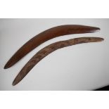 Two early Aboriginal hardwood boomerangs, one carved with kangaroo's, longest 23"