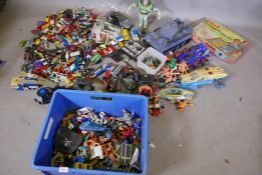 A quantity of children's toys, cars, Matchbox, Corgi, Majorette etc, wrestlers etc