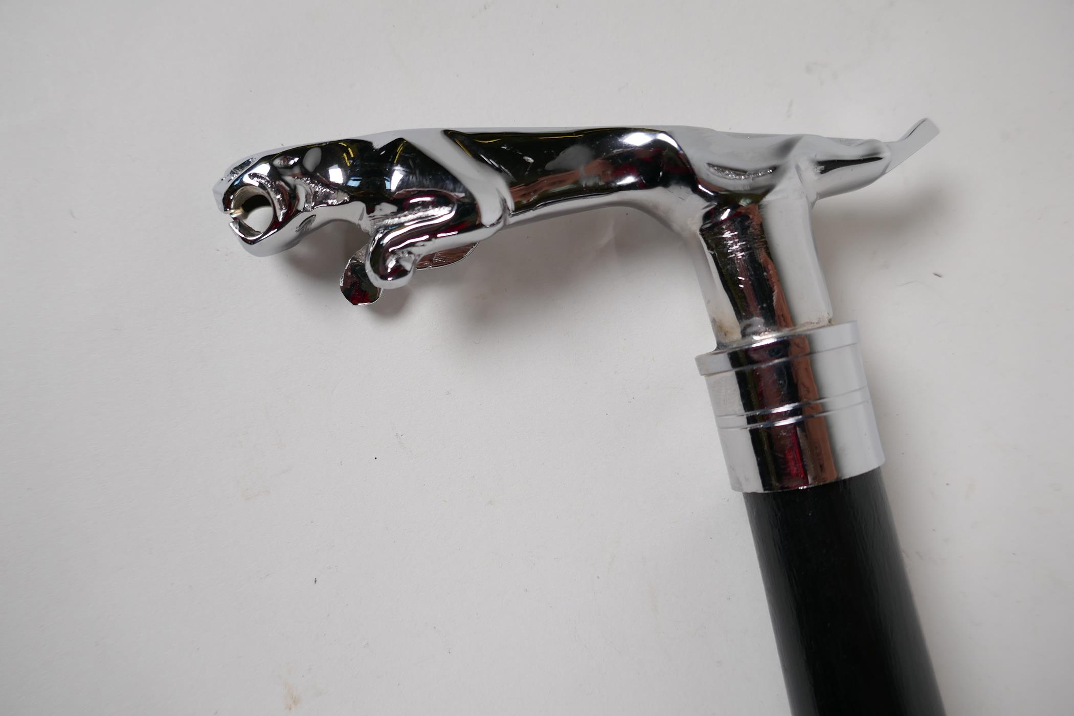 An ebonised walking stick with chromium plated Jaguar mascot handle, 36" long - Image 2 of 2