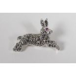 A sterling silver & marcasite brooch in the form of a lizard, 3" long