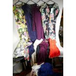 A quantity of retro and vintage ladies clothing, mainly dresses from Karen Millen, Ralph Lauren, Max