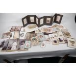 A quantity of C19th photographs and greeting cards, including a leather pocket family album