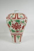 A Chinese red & green porcelain Meiping vase, with raised scrolling floral decoration, 15" high
