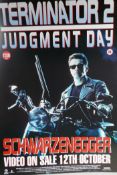 Eight vintage card backed film posters, including: 'Terminator 2 Judgement Day', 'Total Recall', '