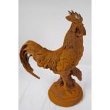 A cast iron garden figure of a cockerel, 17" high