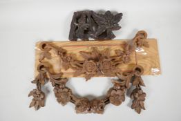 Two carved wooden garlands, 13" wide and an antique carved oak fragment