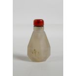 A Chinese faceted white agate snuff bottle, 2" high