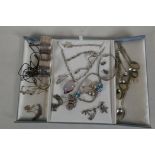 A collection of silver costume jewellery to include Pandora, Mickey and two silver hallmarked napkin