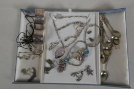 A collection of silver costume jewellery to include Pandora, Mickey and two silver hallmarked napkin