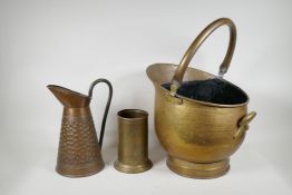A brass coal scuttle, a Kinco brass vase and a copper jug marked R Perry Wolverhampton, 12"high
