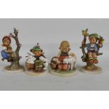 Four Goebels Hummel figures, largest 5" high