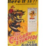 A framed film advertising poster for 'The Calgary Stampede', starring Hoot Gibson, directed by
