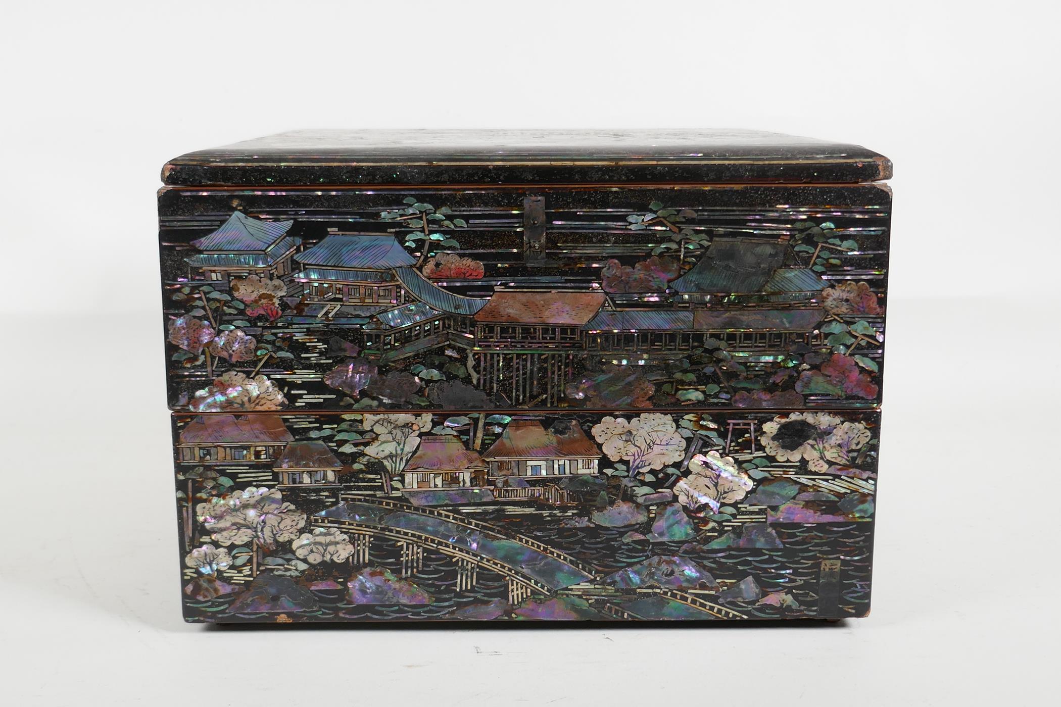 A Japanese Mother of Pearl inlaid black lacquer multi layer box, decorated with views of riverside - Image 4 of 6