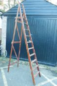 A vintage 'Slingsby' ladder, stamped 1840M, with trade label, 125" long