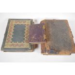 A Victorian leather photograph album with gilt brass hasps, 6" x 5", and two larger, both A/F