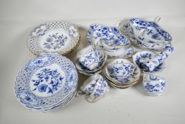 A part service of Meissen Onion pattern tea and dinner ware to include pierced rim plates, gravy