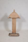 A C19th stripped pine stick stand with a carved finial, and drip tray, 31" high