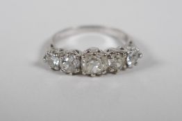 An 18ct white gold fie stone diamond ring, approx 1.65ct, size 'O'