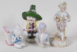 A Continental porcelain figurine of a Dandy holding two puppies, another of a corpulant man in a