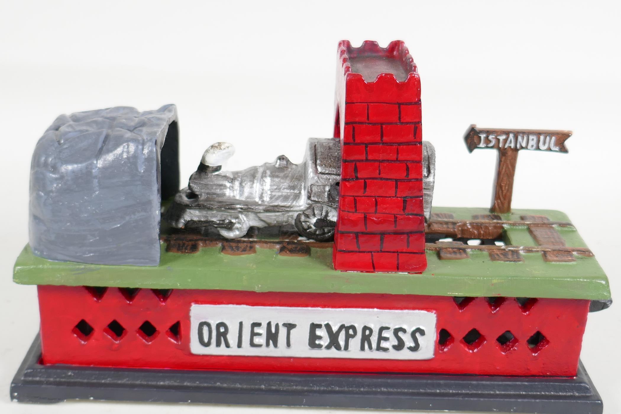 A replica cast iron "Orient Express" train money box, 8½" long - Image 2 of 2