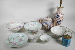 A collection of C19th and early C20th Chinese famille rose porcelain including bowls, cabinet plates