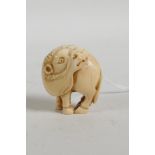 A C19th Japanese carved ivory ram netsuke, signed to base, 1½"